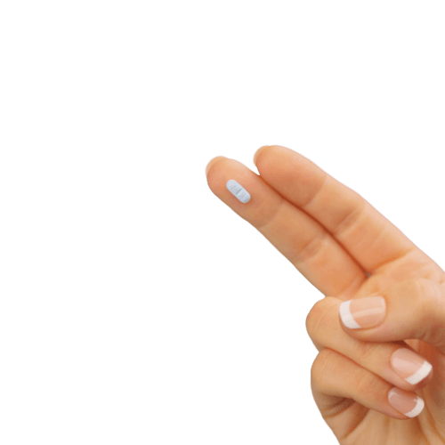 Hand holding pill